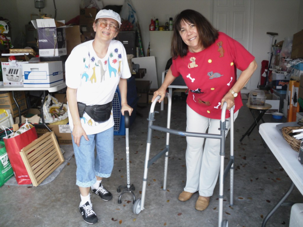 L to R: Nora Candelario and Nancy Rozon showing some of the articles for sale